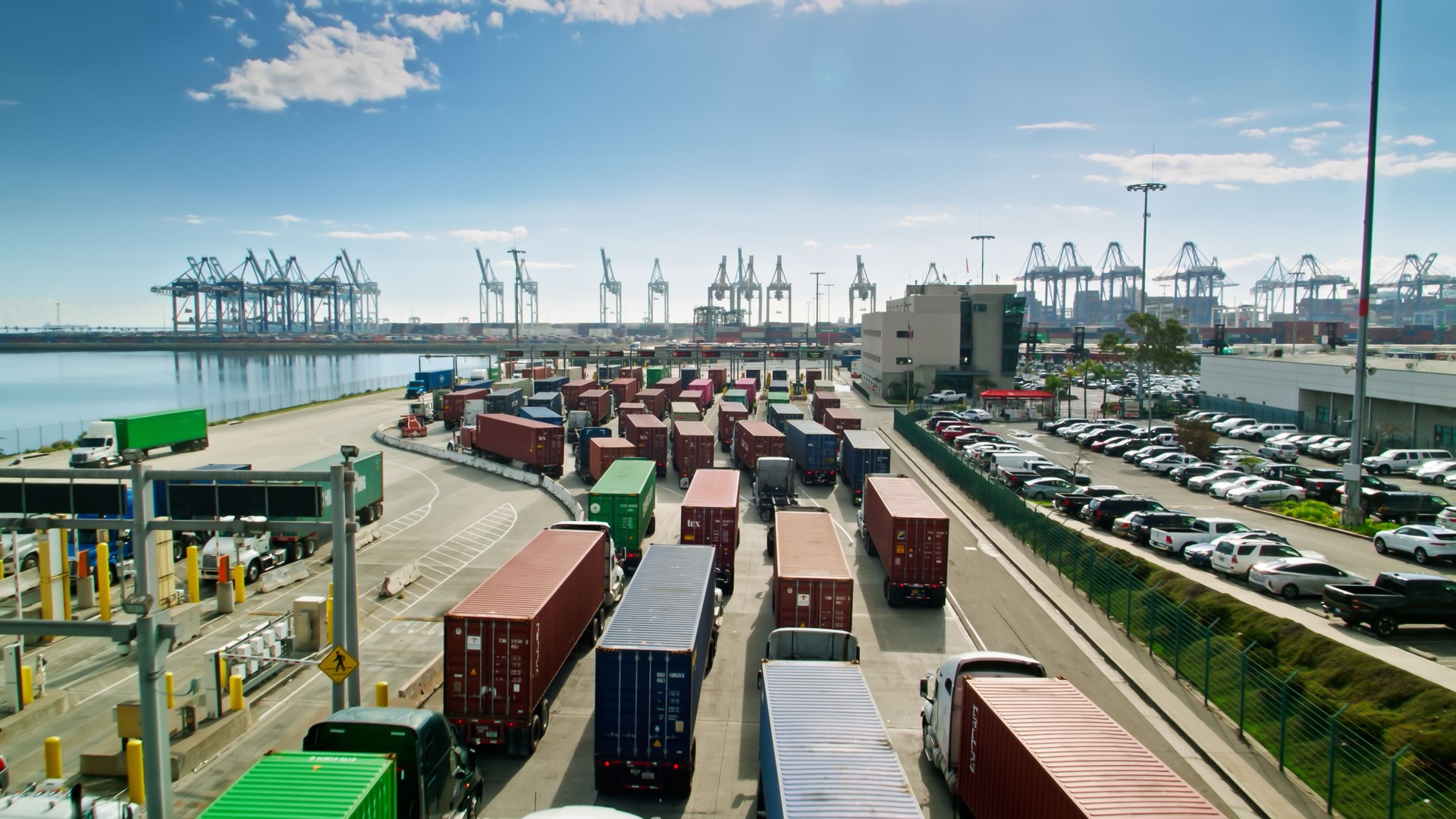 Drone Shot of Trucks at Terminal Entrance in Port of Los Angeles